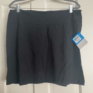 Cute black mini workout skirt.  Great to wear after yoga over your leggings!